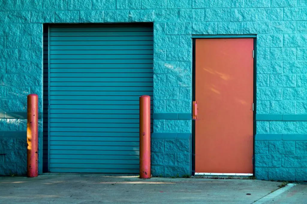 brown panel door near roll up gate 845242