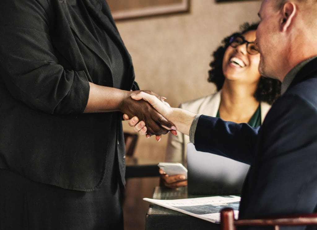 restaurant shaking hands smiling suit support team 1431763 pxhere.com