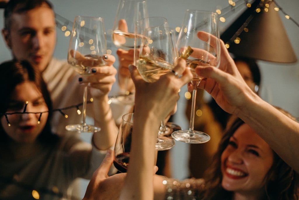 selective focus photography of several people cheering wine 3171815